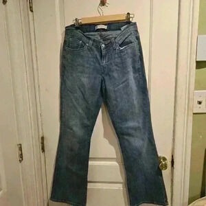 P7419Levis 529 curvy bootcut medium wash size 30in